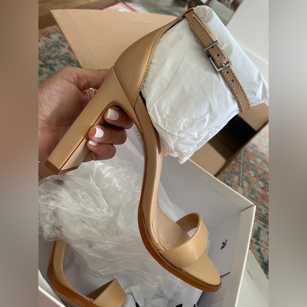 Brand new Schutz heels never worn with box and receipt. Nude size 6.